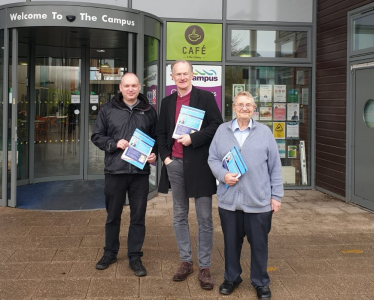 Peter Crew, Michal Kus and John Penrose delivering leaflets in South Worle